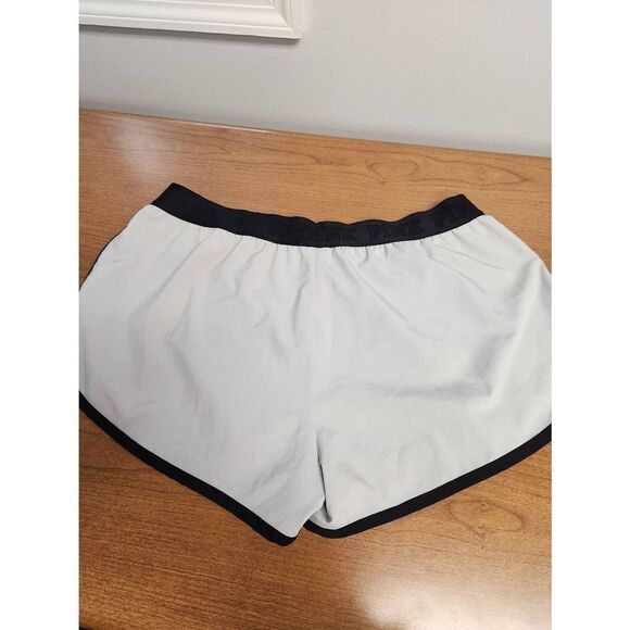 Pink LARGE grey shorts with black trim and PINK made out of Zebra font in yellow - Picture 6 of 7